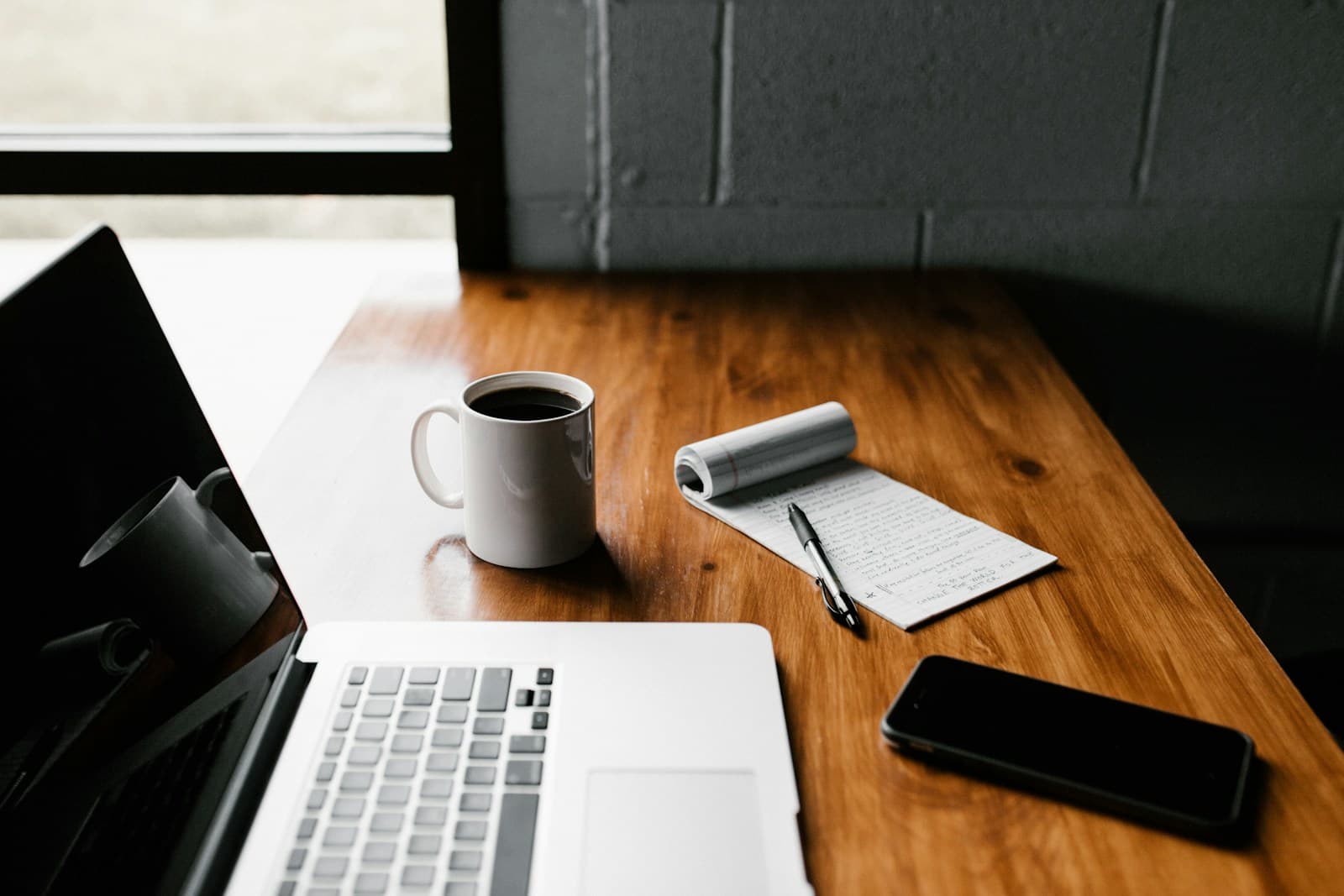Writer working on buying guides at a laptop