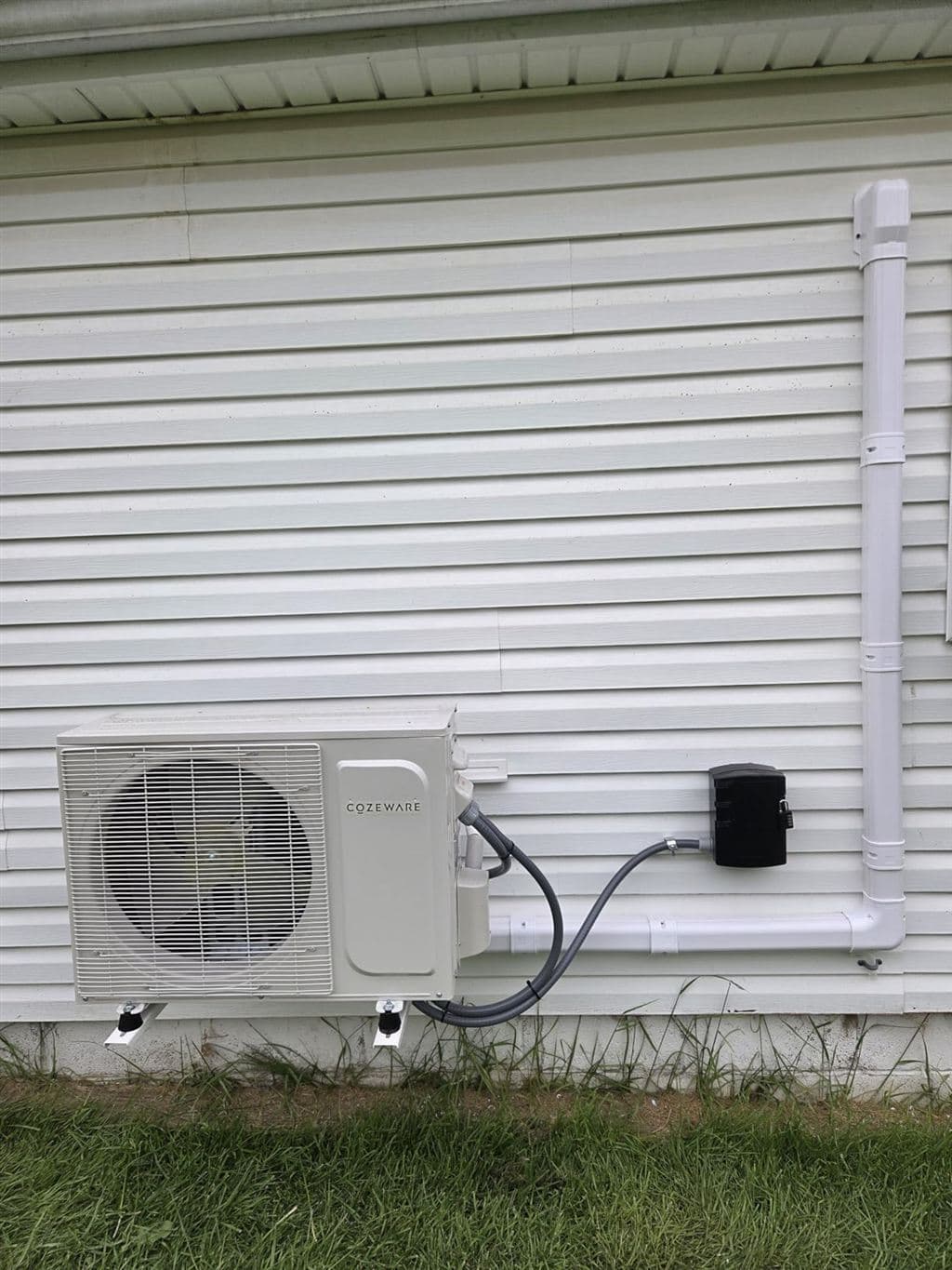Outdoor condenser and protected line set for a ductless mini split air conditioner